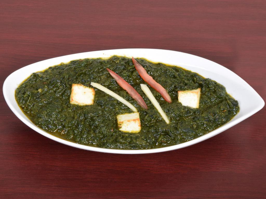 Palak Paneer · Spinach cooked with ginger, garlic and cumin.