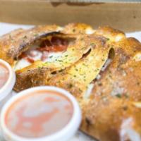 Cheese and Cheese Calzone · Mozzarella, provolone and ricotta cheese with our special sauce on the side.