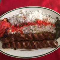 Luleh Kabob Plate · Choice ground beef mixed with special spices and tomatoes then barbecued. Served with choice...