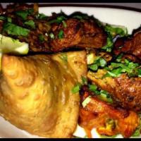 Assorted Appetizers for 2 · Samosa, onion bhaje, chicken tikka, seekh kebab and lamb tikka.