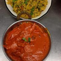 Chicken Makhani Dinner Combo  · Boneless tandoori chicken cooked in exotic tomato, nuts and butter sauce.