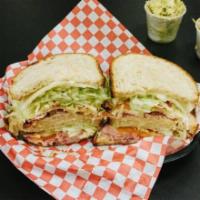Triple Decker Club for Two · House smoked real turkey and hickorywood slow smoked ham, thick cut applewood bacon, smoked ...