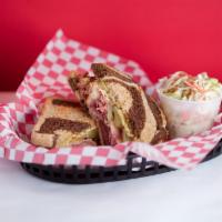 Charlie's Corned Beef on Rye · Charlie's home made traditional corned beef, smoked Swiss cheese, French's yellow mustard, a...