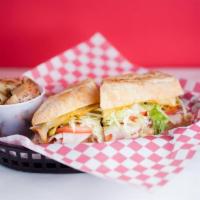 Real Ham Sandwich · Hickorywood slow smoked ham, smoked gouda cheese, tomato, lettuce, red onion, pepperoncini, ...