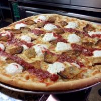 White Eggplant Pizza · White pizza with our homemade breaded eggplant and dollops of our seasoned ricotta cheese an...
