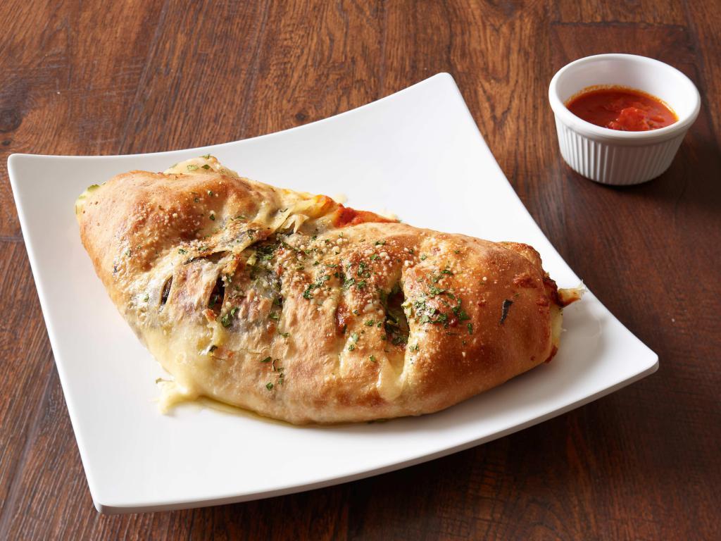 Cheese Steak Stromboli · Sirloin steak sauteed with green peppers, onions, mushrooms with mozzarella cheese. 