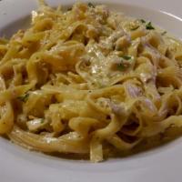Chicken Fettuccine Alfredo · Grilled chicken with our homemade Alfredo sauce tossed with fettuccine pasta.