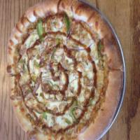 Chicken Teriyaki Pizza · Grilled chicken, red onions, and green peppers with mozzarella and teriyaki sauce.