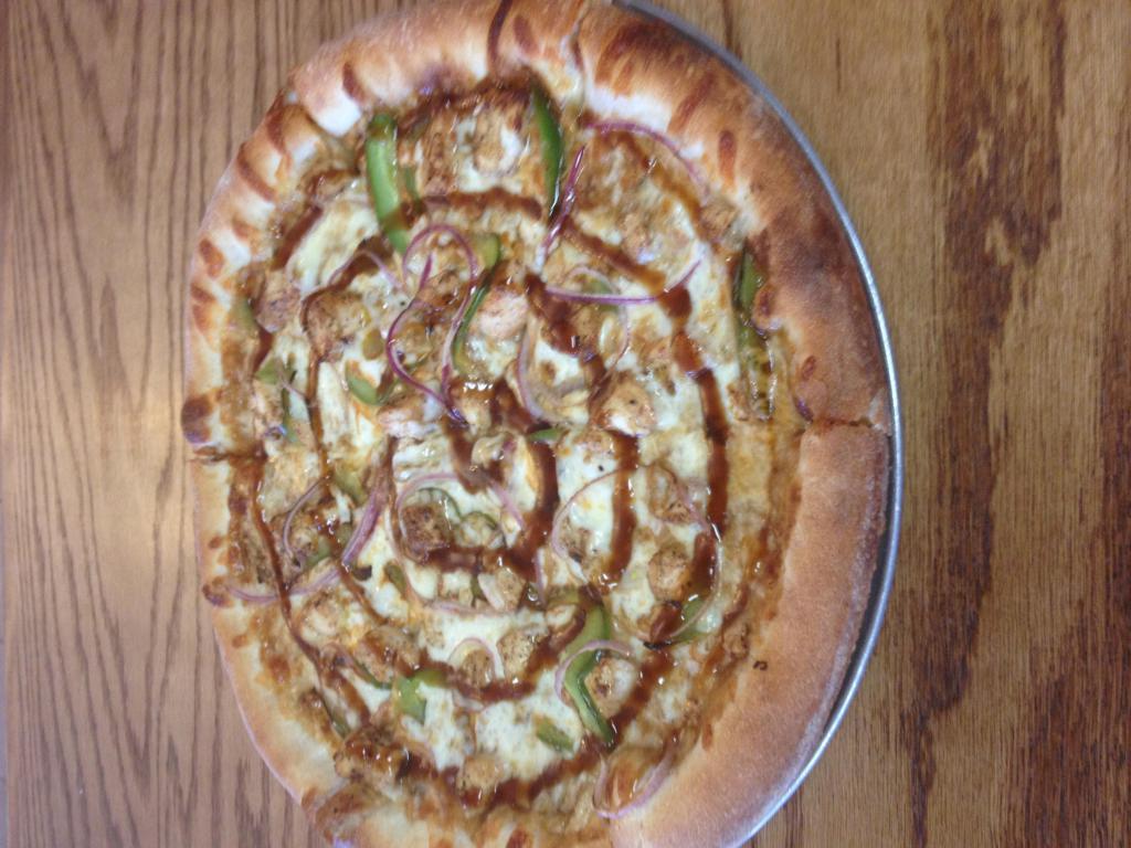 Chicken Teriyaki Pizza · Grilled chicken, red onions, and green peppers with mozzarella and teriyaki sauce.
