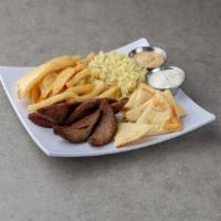 Gyro Greek Platter · Slices of Greek gyro meat (Lamb and Beef) served with Greek pita bread and tzatziki sauce.