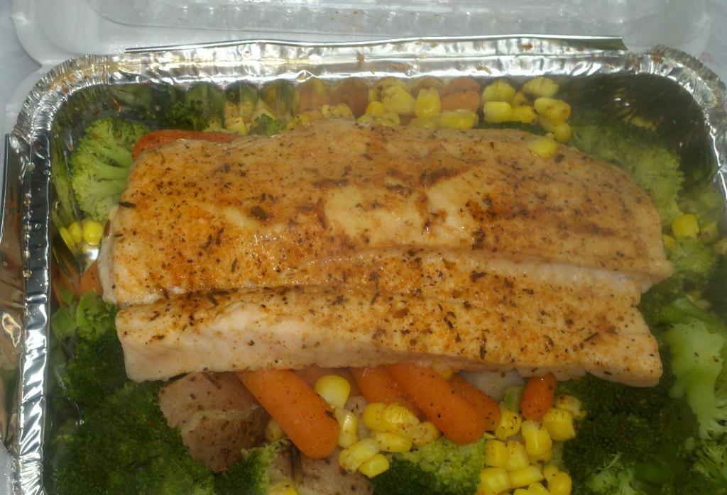 37. Salmon Fillet · Served with potatoes and vegetables.