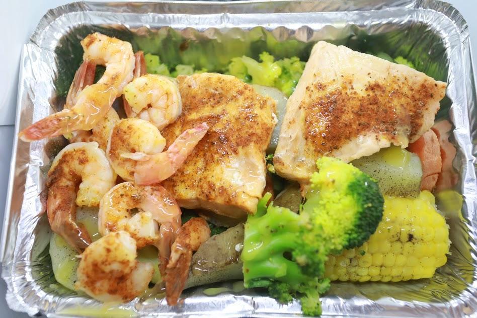 38. Salmon and Shrimp · 5 pieces of shrimp and 1 piece of salmon. Served with potatoes and vegetables.
