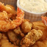Fish Boat · Four pieces of whiting, five shrimp and clam strips served with fries.