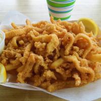 Clam Strips · Crispy pieces of fried clam, golden and delicious. 