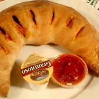 Calzone · A turnover made of pizza dough, pizza sauce, stuffed with ricotta cheese, blend of mozzarell...