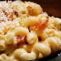 Mac and Cheese · beemster gouda, white cheddar, provolone, topped with toasted bread crumbs.