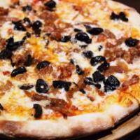Calabrian Sausage Pizza · Sausage, Marinara, caramelized onion, oil cured olives.