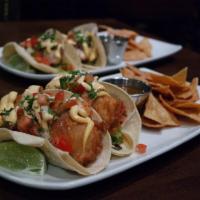 Fish Tacos · choice of... Blackened (Grilled) Mahi Mahi or Cripsy (Fried) true cod, lettuce, pico de gall...