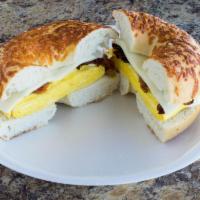 Big Papi · Sausage, bacon, egg and cheese between two slices of a French toasted bagel. Served with map...