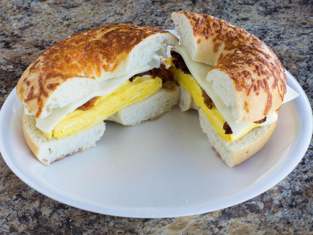 Big Papi · Sausage, bacon, egg and cheese between two slices of a French toasted bagel. Served with maple syrup dip.