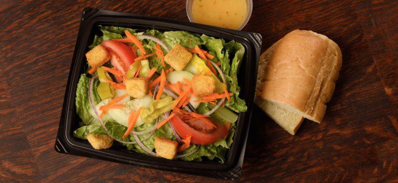 House Salad · Chopped romaine, red onion, tomato, cucumber, pepperoncini, shredded carrots, seasoned croutons and served with choice of dressing.
