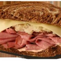 Reuben Sandwich · Thinly sliced pastrami, sauerkraut, melted Swiss and 1000 island dressing on roasted marble ...