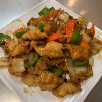 Fish Fillet with Black Bean Sauce · Tender sole fish fillet with diced bell pepper, onions and carrots stir fried in a black bea...