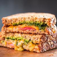 Grilled Cheese Sandwich · Cheddar, tomato, caramelized onion, pesto and grain bread. For adding additional ingredients...