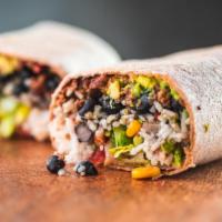 Impossible Burrito · Romaine, rice, spiced vegan impossible meat, black beans, corn, pico de Gallo, avocado, spec...