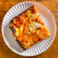 Vodka Slice · Smooth tomato, vodka and cream sauce and a blend of cheeses.