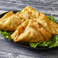 A4. Crab Rangoon · 4 pieces. Fried wonton wrapper filled with crab and cream cheese. 