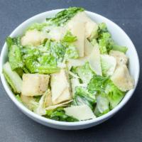 Caesar Salad · Fresh crisp romaine lettuce, shaved Parmesan cheese and croutons tossed in our Caesar dressi...