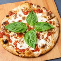 Personal Margherita Pizza · Fresh mozzarella cheese, tomato sauce and basil.
