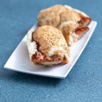 Chicken Parmigiana Sandwich · Homemade chicken cutlets topped with Fiorella’s signature marinara sauce and mozzarella chee...