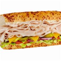 3. Turkey and Cheddar Sandwich · 1/4 lb. of turkey and cheddar cheese with mayo, served Togo's Style (lettuce, tomatoes, onio...