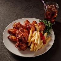 10 Piece Wings Combo · With Fries & Can Soda.