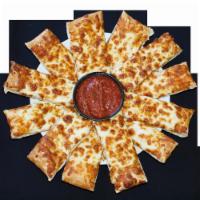 Cheesy Bread · Our homemade dough topped with cheddar and mozzarella cheese and served with marinara and ga...