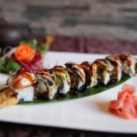 J7. Godzilla Roll · Soft shell crab, asparagus, topped with eel and avocado.