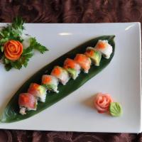 J10. Rainbow Roll · Fresh tuna, salmon, white fish and avocado on top of a California roll.