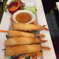 4 Piece Shrimp Rolls · Crispy shrimp roll served with plum sauce.