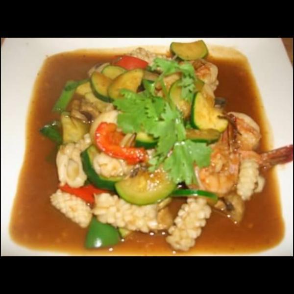 Pad Po Tak · Sauteed shrimp, scallop and squid with chili, garlic, mushrooms and zucchini in a spicy white wine sauce. Spicy.