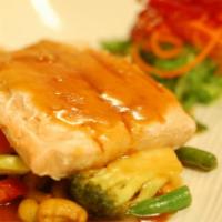 Salmon Cha Cha Cha · Salmon topped with green bean, baby corn, cashew nuts, onion, pepper and mushroom in three f...