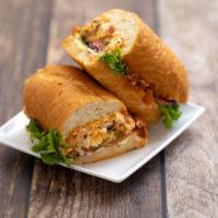 25. DTSM Sandwich · Marinated chicken, marinara sauce and provolone cheese. Mayo, mustard, secret sauce, lettuce...