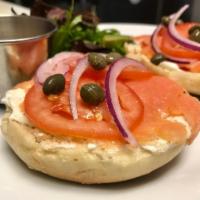 Lox and Bagel · Plain bagel with smoked Scandinavian salmon, herbed cream cheese, tomatoes, onions and caper...