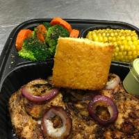 Turkey Chop Dinner · Turkey chops grilled topped with grilled onions, served with white or brown rice, steamed br...
