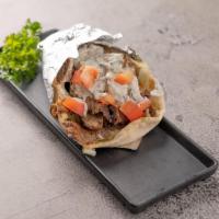 Gyro Pita Sandwich · Beef or chicken with lettuce, tomato and tzatziki sauce in pita bread.