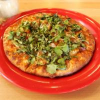 The Spice Route Pizza · Chicken marinated in a spicy tandoori sauce, green pepper, red onion, cilantro and mozzarella.