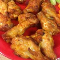 Boneless Wings · Choice of ranch, bleu cheese or sesame oriental dipping sauce served with carrot sticks and ...