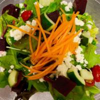 Roasted Beets Salad · Red beets, crumbled feta, baby arugula, balsamic dressing