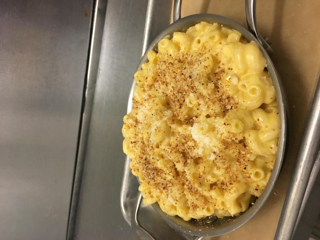 Truffle Macaroni and Cheese · Our classic rich and creamy with Three cheeses, truffle oil and toasted breadcrumbs.